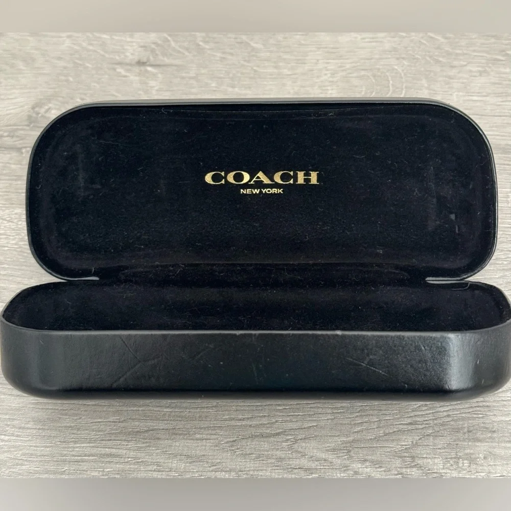 COACH New York Glasses case Black. Used. Has some small dents. See photo.